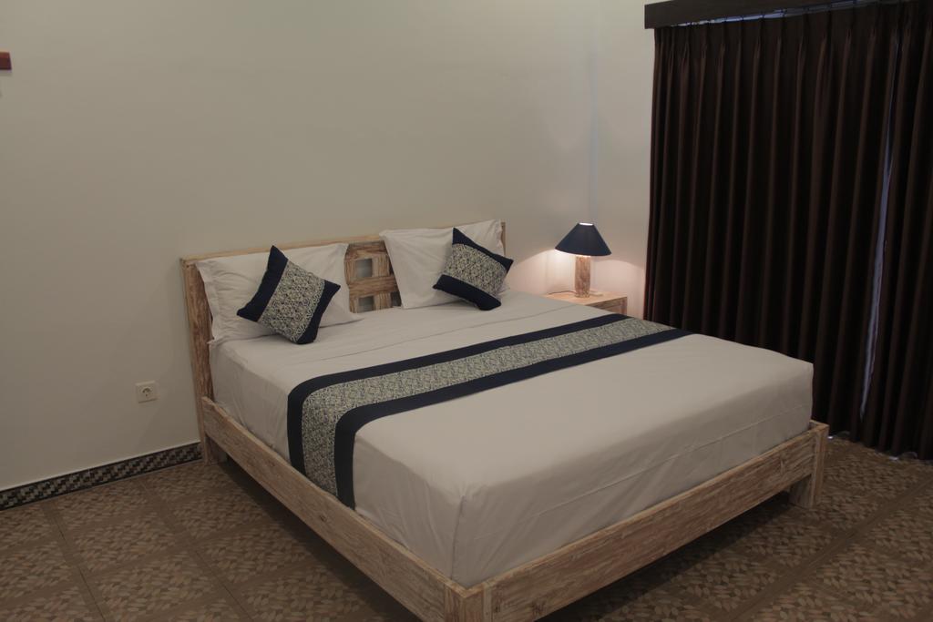 Nyoman Guesthouse Canggu Стая снимка